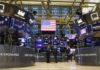 U.S. Stock Soar to New Records, Dow Jones Rise By More Than 1,500 Points Traders work on the floor of the New York Stock Exchange on Wall Street in New York City in 2022